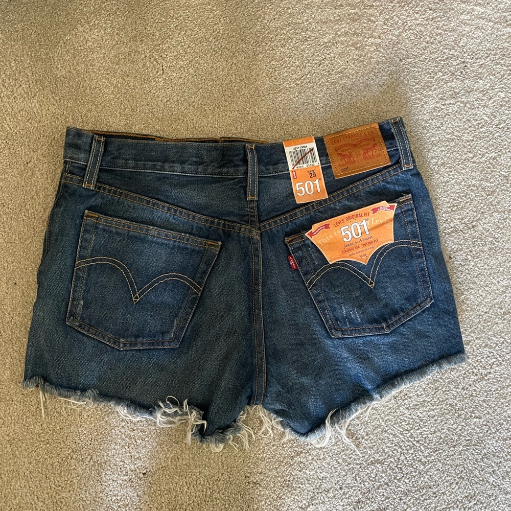 Brand new 501 Levi’s shorts. Classic style new with tags. Darker wash